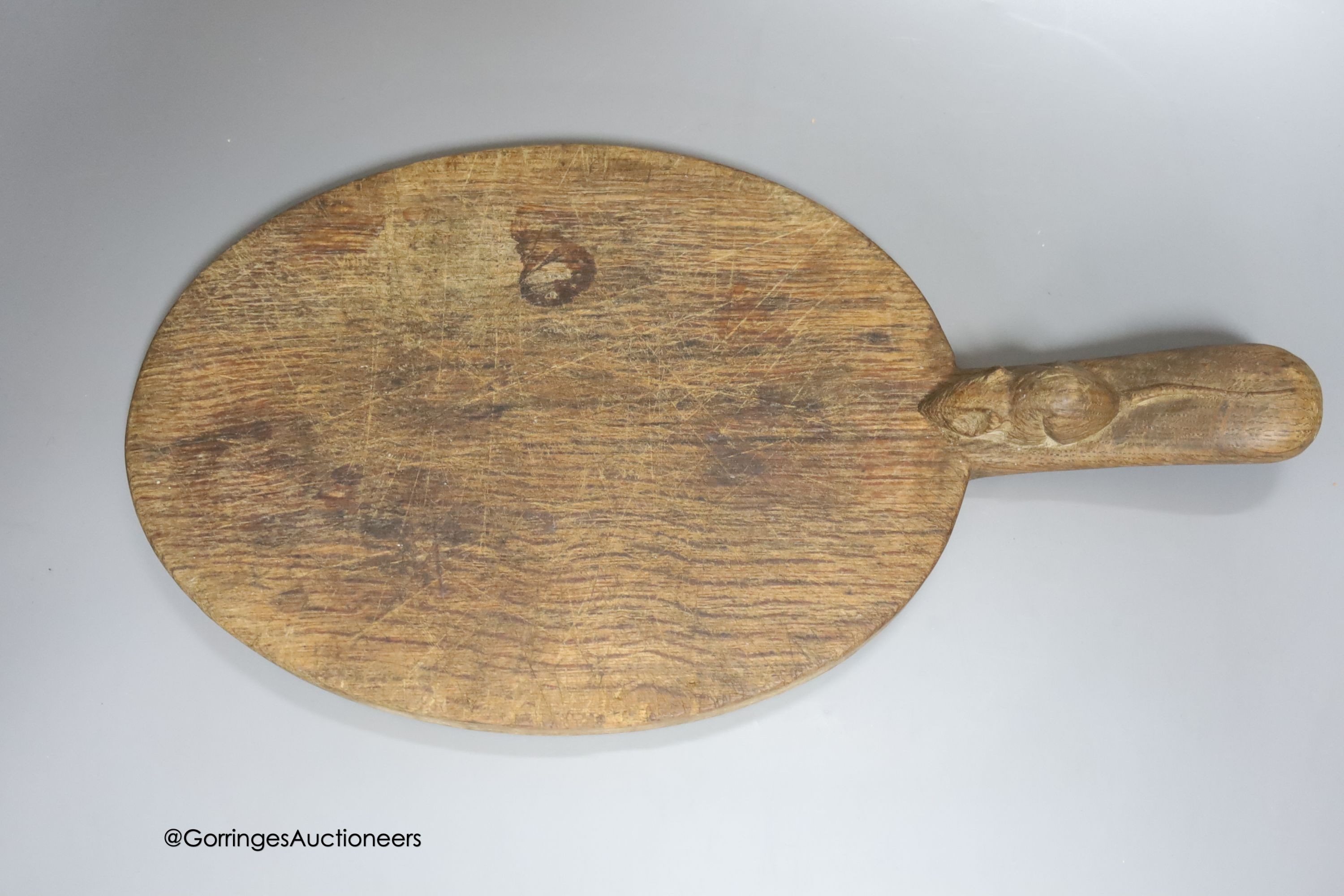 A Mouseman cheeseboard, length 38cm